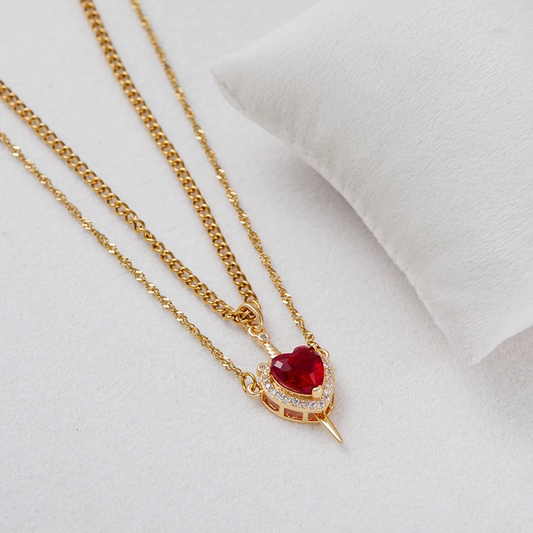 Heart & Dagger Couple Necklace – Sparkling Red Stone Pendant for Lovers